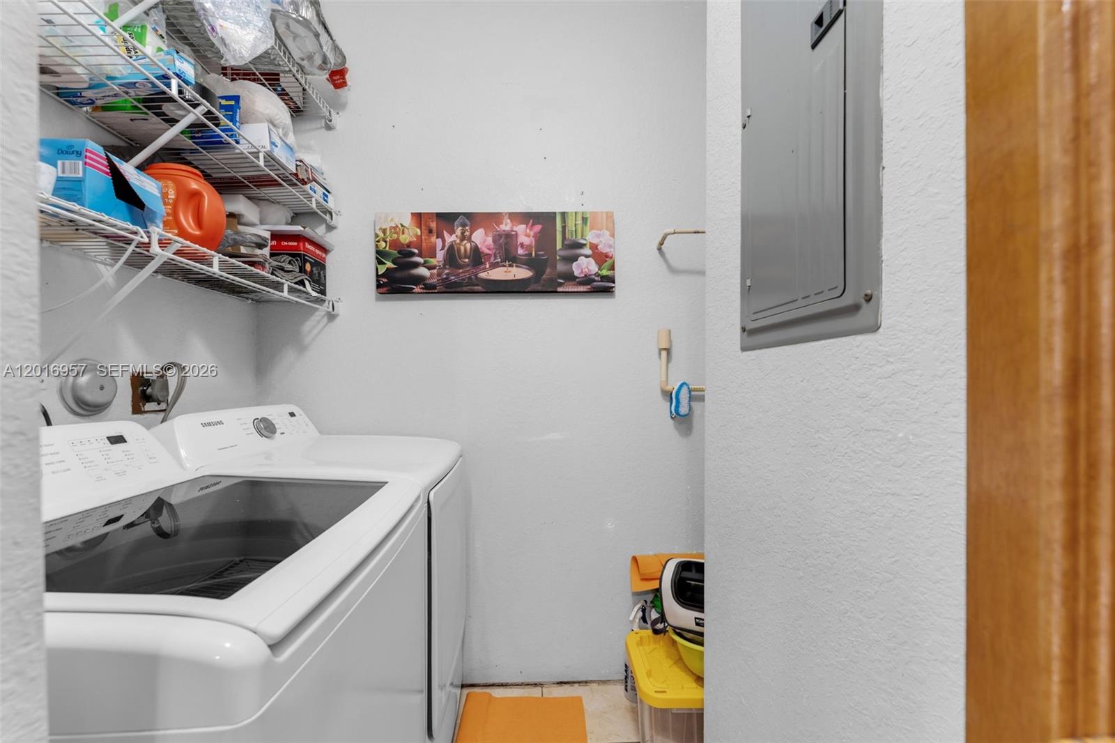 12266 Southwest 215th Terrace Miami, FL 33177 - Photo 9 of 29 a utility room with dryer and washer