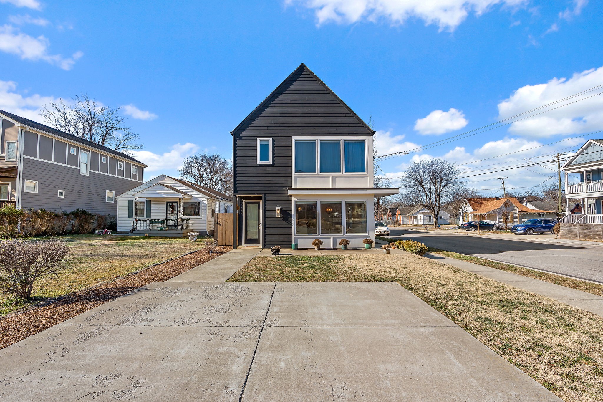 1925 10th Avenue North Nashville, TN 37208 - Photo 1 of 40 a front view of a house with a yard