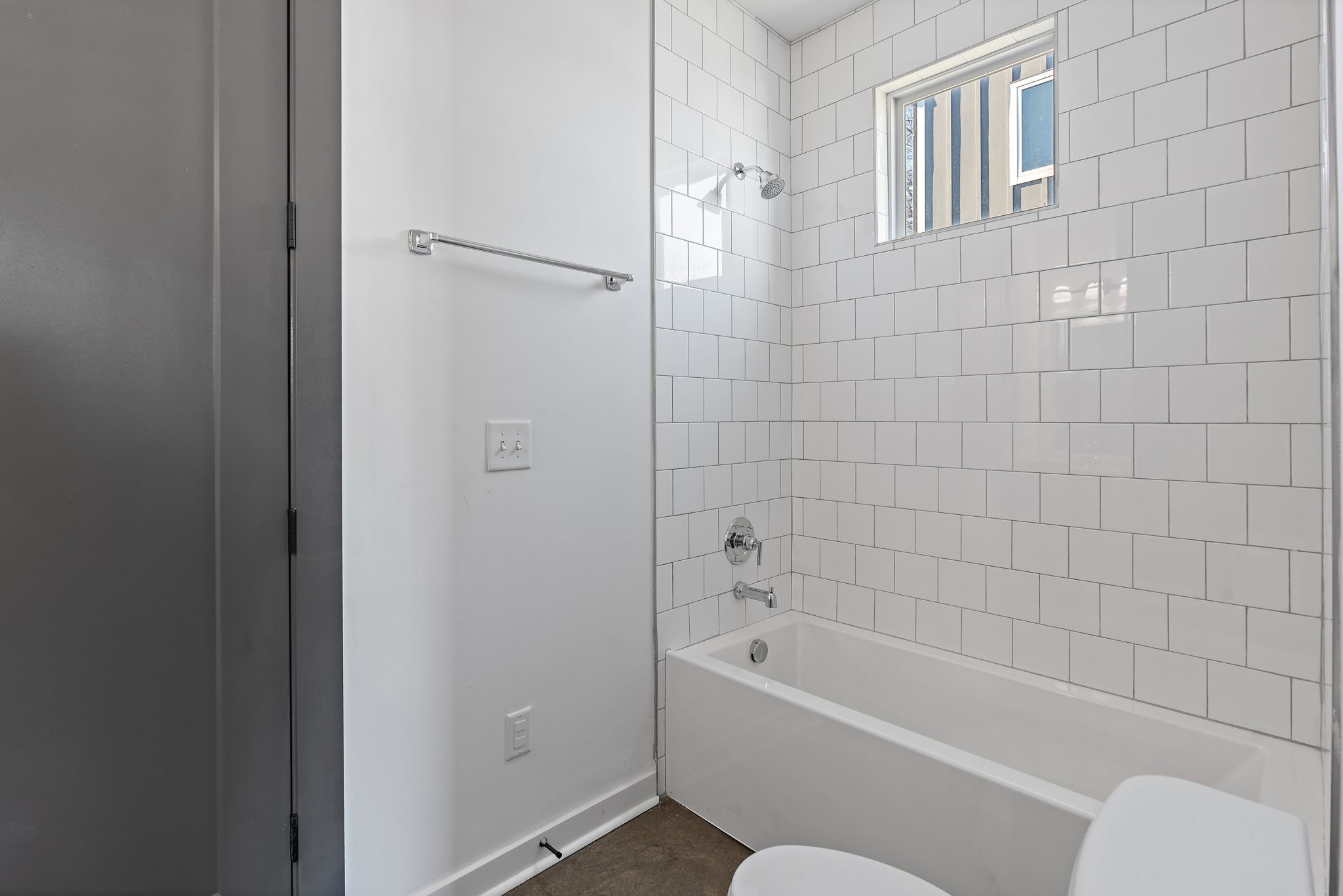 1925 10th Avenue North Nashville, TN 37208 - Photo 18 of 40 a bathroom with a bathtub and a shower