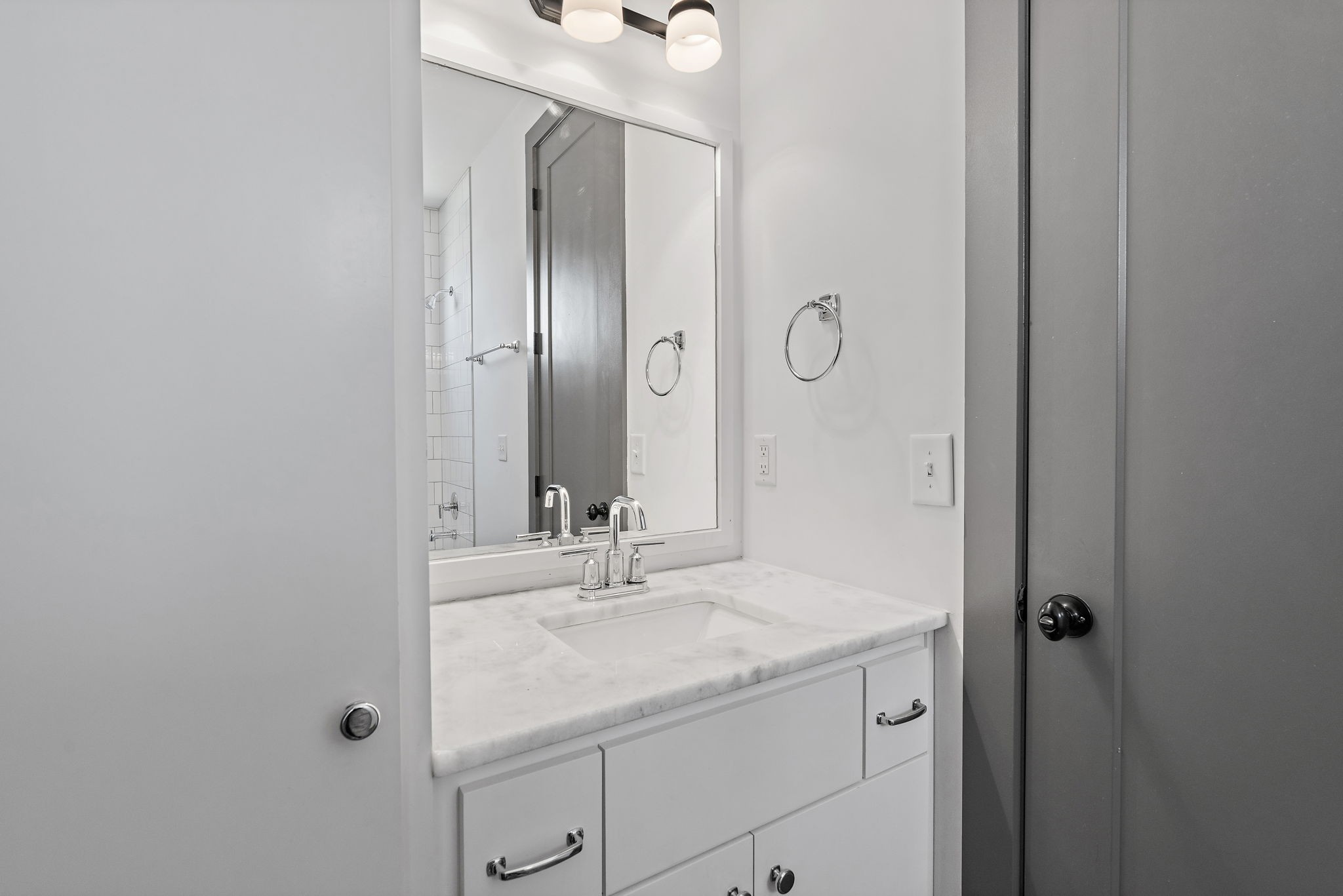 1925 10th Avenue North Nashville, TN 37208 - Photo 19 of 40 a bathroom with a sink and a mirror