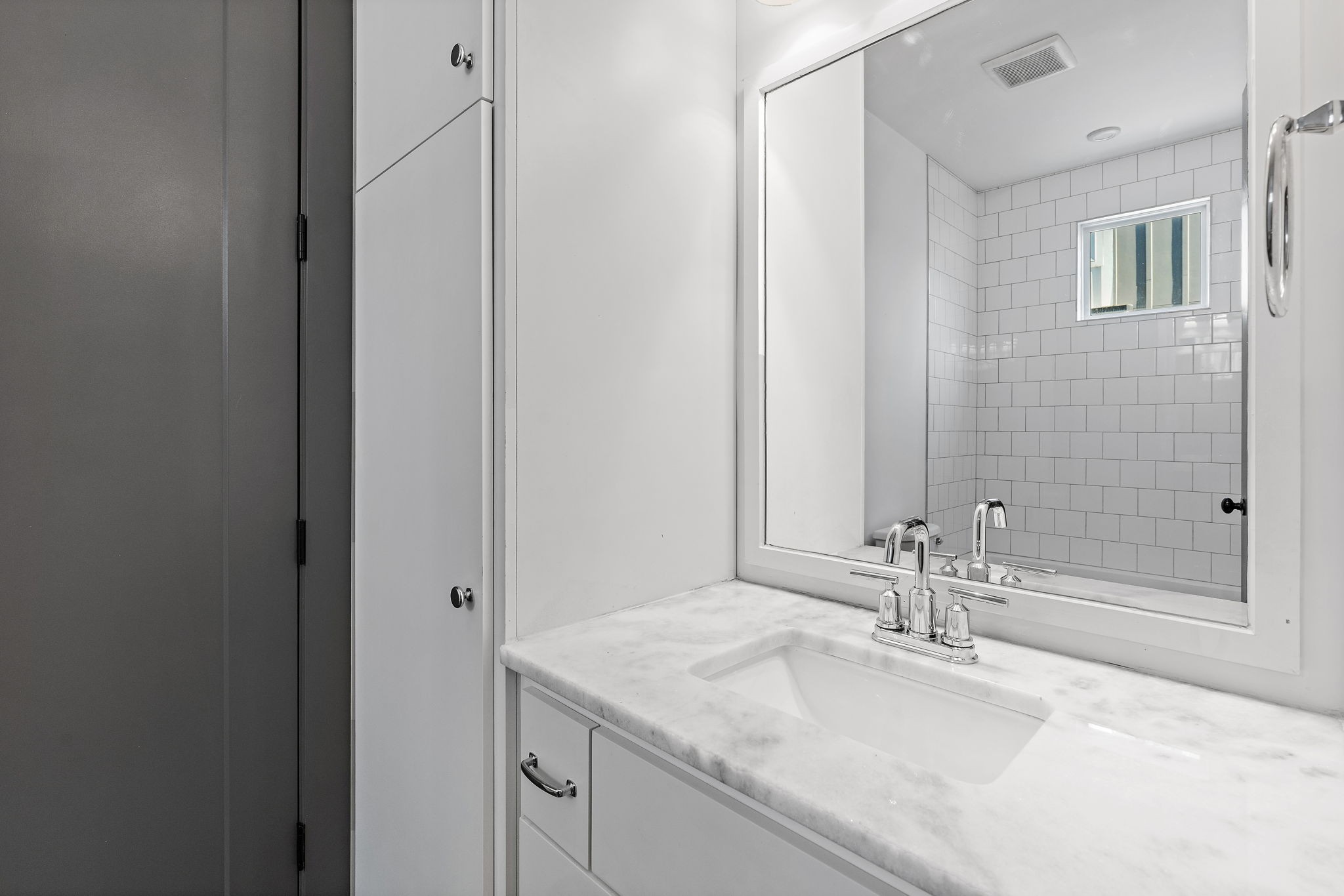 1925 10th Avenue North Nashville, TN 37208 - Photo 22 of 40 a bathroom with a granite countertop sink and a mirror
