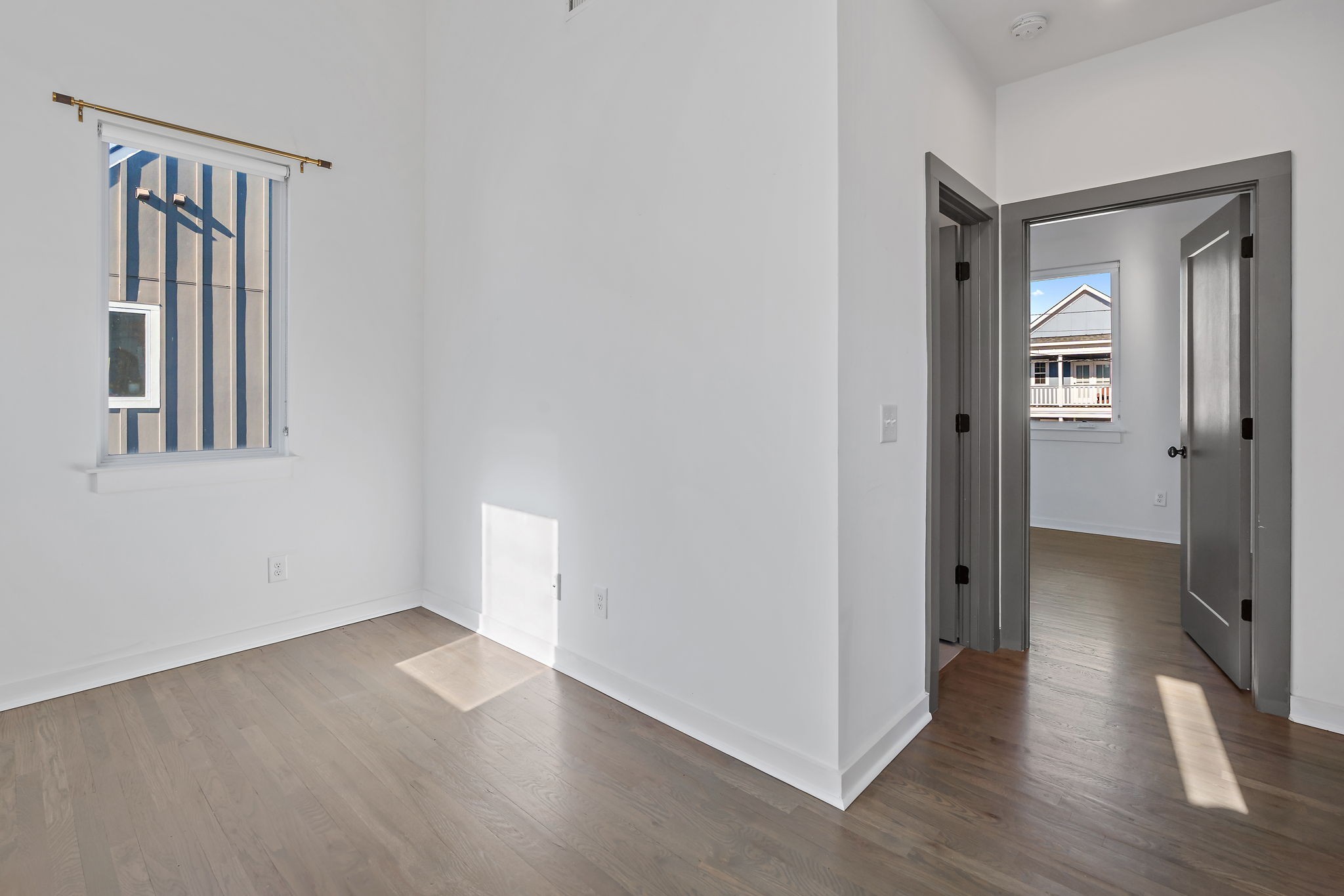 1925 10th Avenue North Nashville, TN 37208 - Photo 25 of 40 wooden floor in a hall with a window