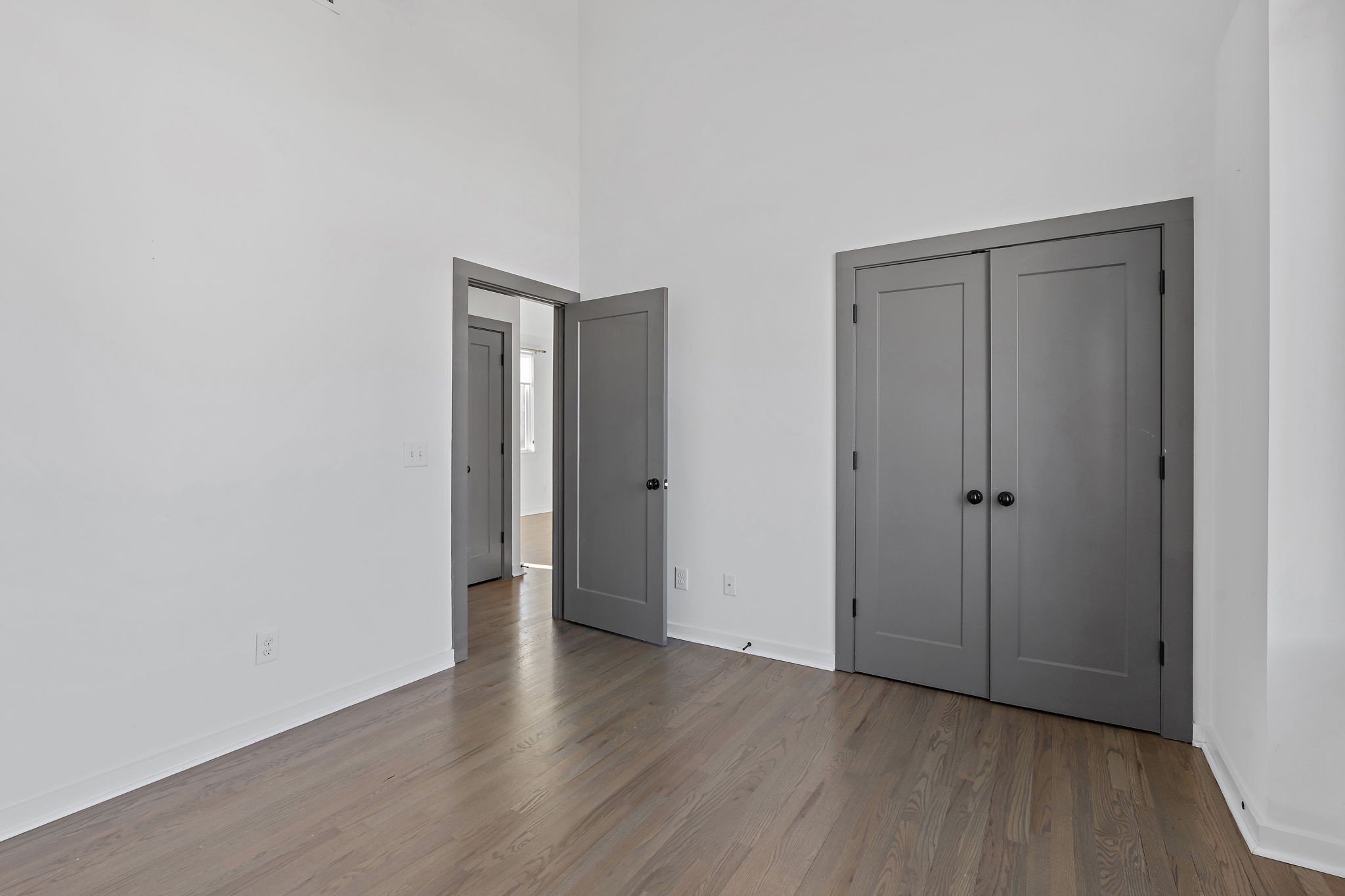 1925 10th Avenue North Nashville, TN 37208 - Photo 30 of 40 a view of an empty room with wooden floor and closet