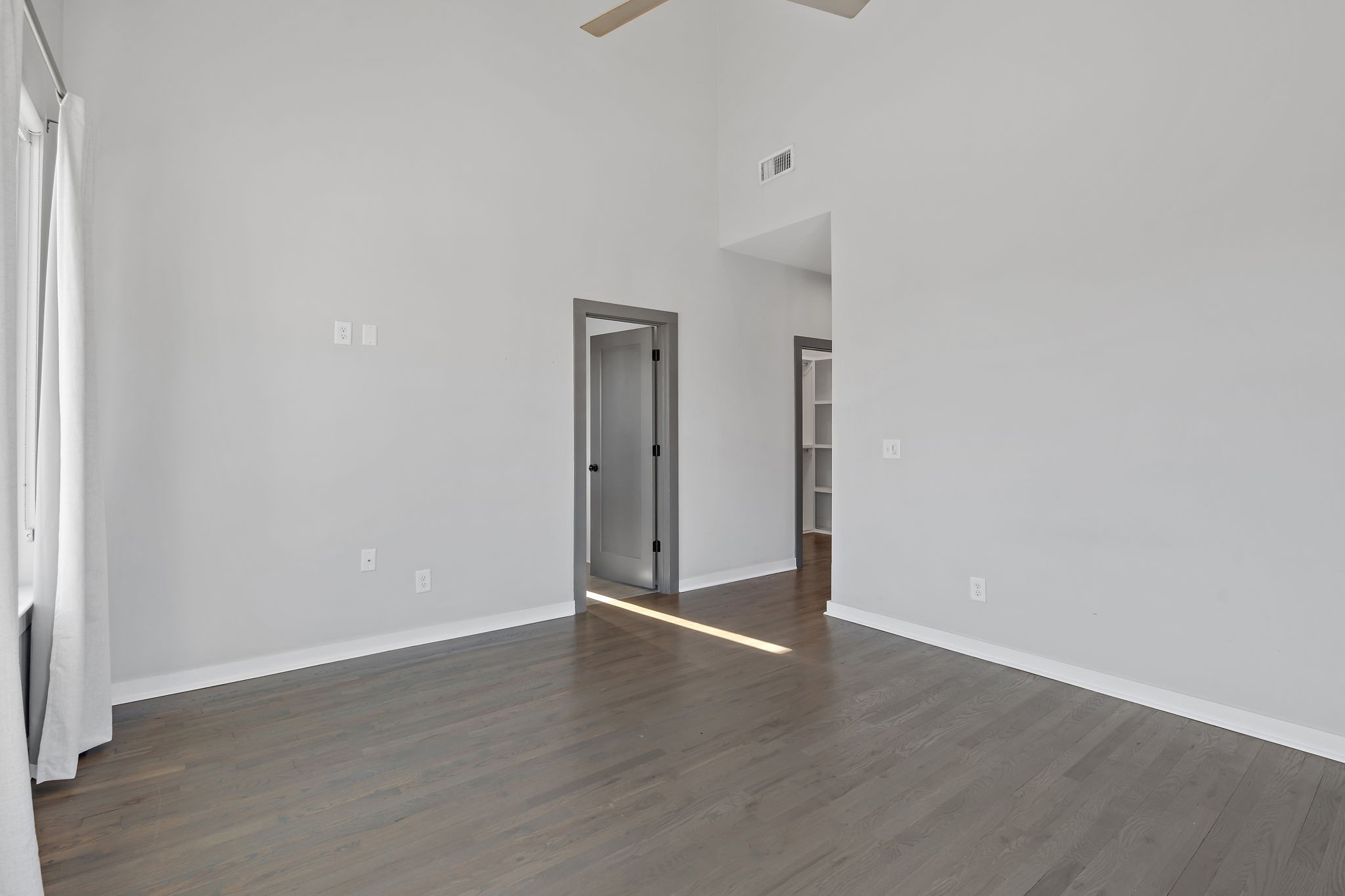 1925 10th Avenue North Nashville, TN 37208 - Photo 32 of 40 a view of an empty room with wooden floor