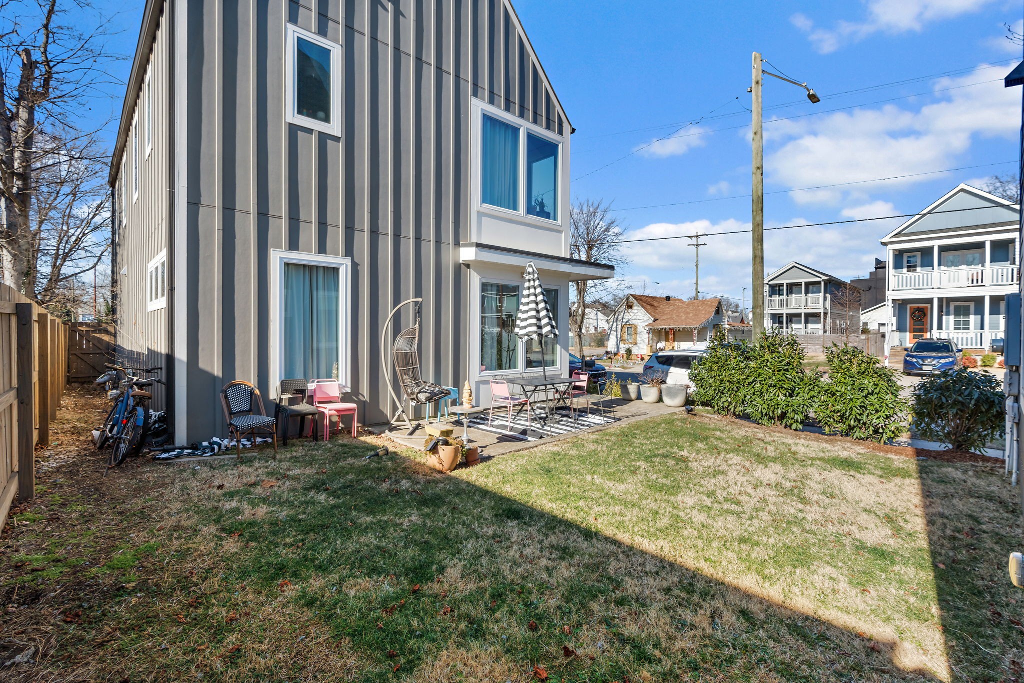 1925 10th Avenue North Nashville, TN 37208 - Photo 37 of 40 a view of a house with backyard sitting area and swimming pool
