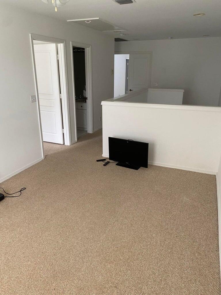 21530 St Andrews Grand Circle, Unit 27 Boca Raton, FL 33486 - Photo 15 of 17 a room with closet