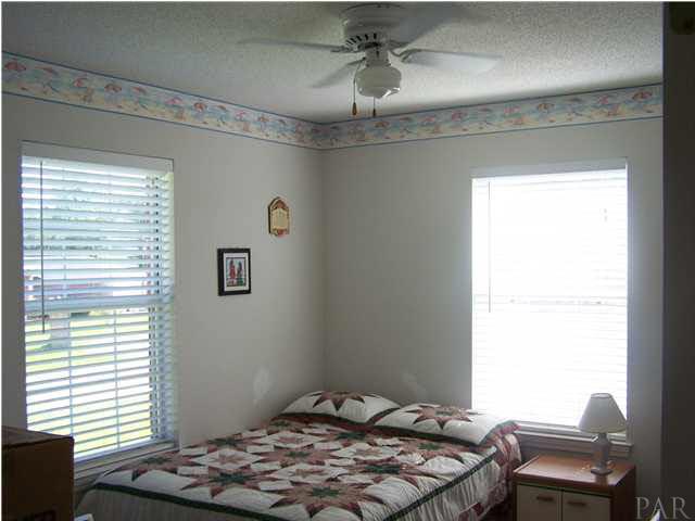 5776 Pebble Ridge Drive Milton, FL 32583 - Photo 12 of 14 One of the 3 bedrooms