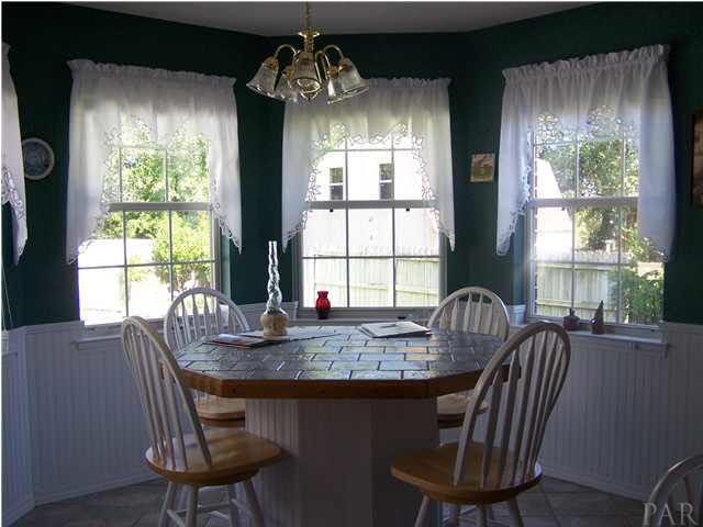 5776 Pebble Ridge Drive Milton, FL 32583 - Photo 7 of 14 Eat-in Kitchen with built in table