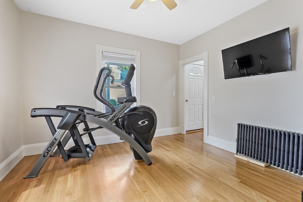 10 Worsted Street Franklin, MA 02038 - Photo 11 of 28 a view of a livingroom with furniture and a flat screen tv