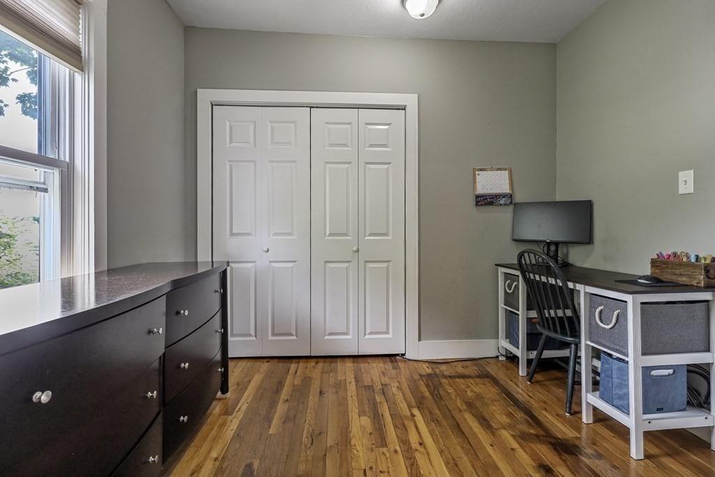 10 Worsted Street Franklin, MA 02038 - Photo 14 of 28 a bed room with a bed and a window