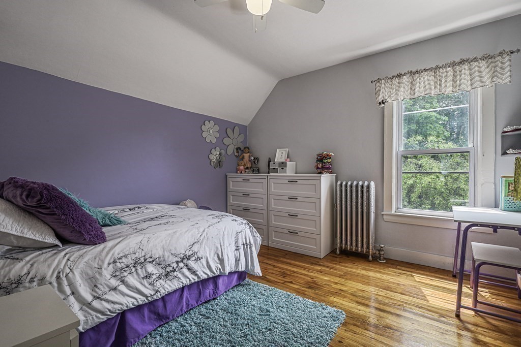 10 Worsted Street Franklin, MA 02038 - Photo 18 of 28 a bedroom with a bed and a window