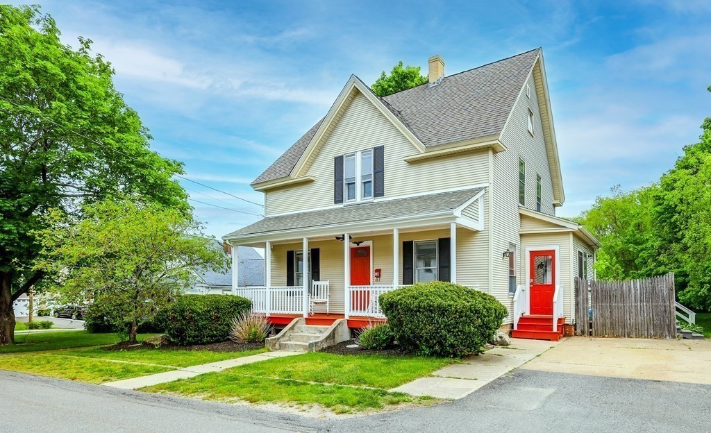 10 Worsted Street Franklin, MA 02038 - Photo 23 of 28 a front view of house with yard and green space