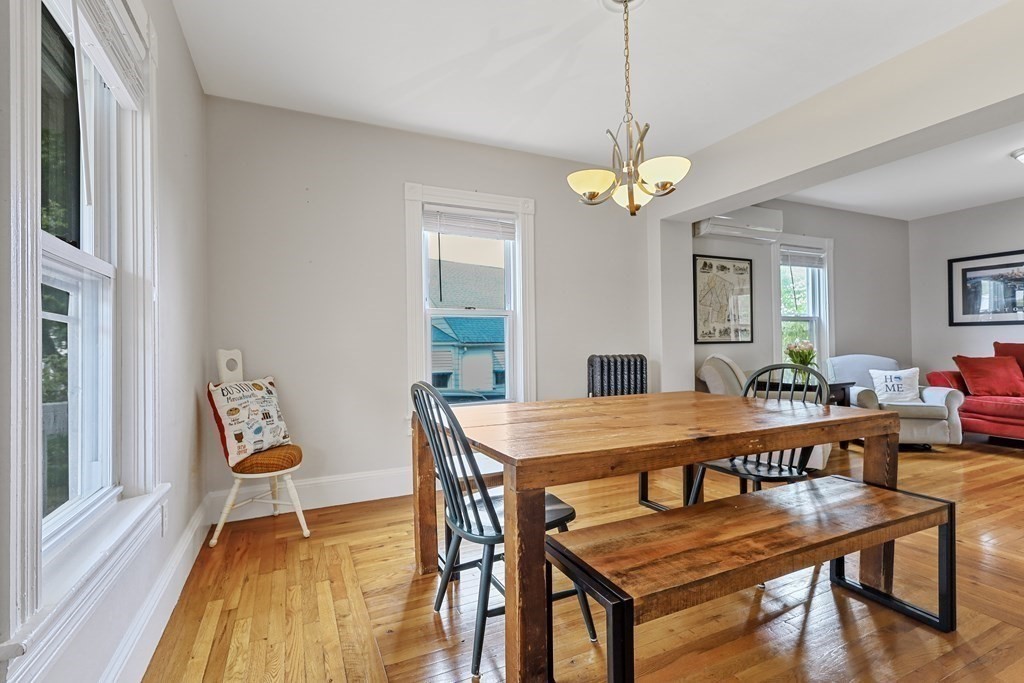 10 Worsted Street Franklin, MA 02038 - Photo 4 of 28 a view of a dining room with furniture window and wooden floor