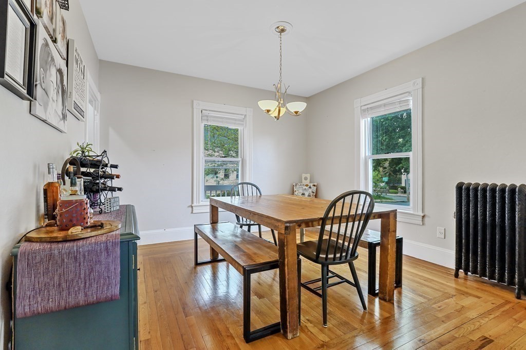 10 Worsted Street Franklin, MA 02038 - Photo 6 of 28 a view of a dining room with furniture window and wooden floor