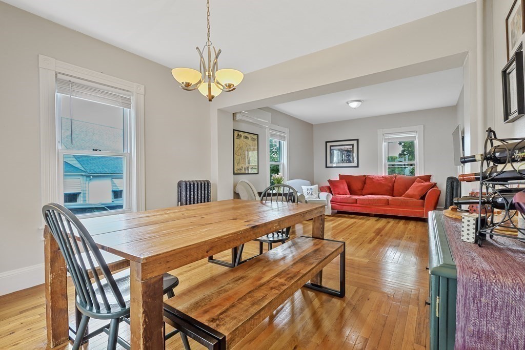 10 Worsted Street Franklin, MA 02038 - Photo 7 of 28 a view of a dining room with furniture window and wooden floor