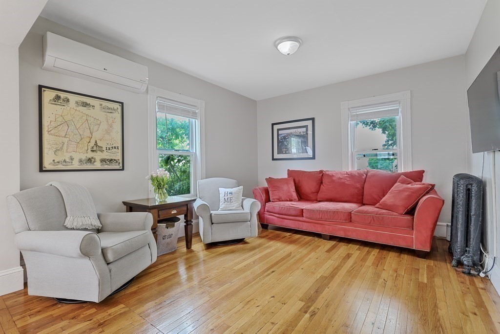 10 Worsted Street Franklin, MA 02038 - Photo 8 of 28 a living room with furniture and a wooden floor