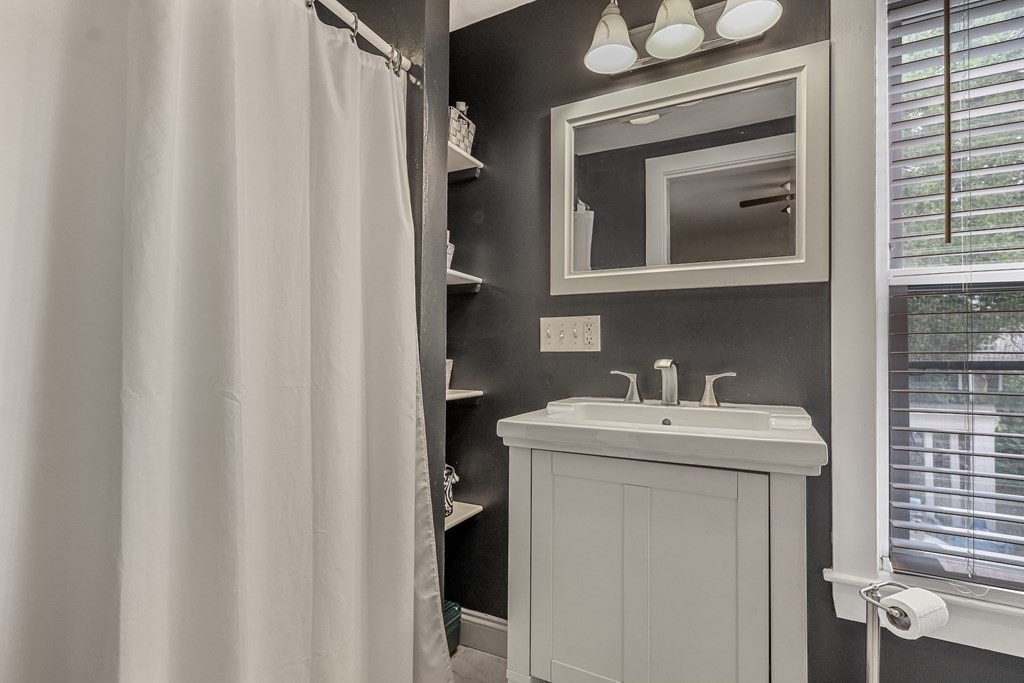 10 Worsted Street Franklin, MA 02038 - Photo 9 of 28 a bathroom with a sink and a mirror