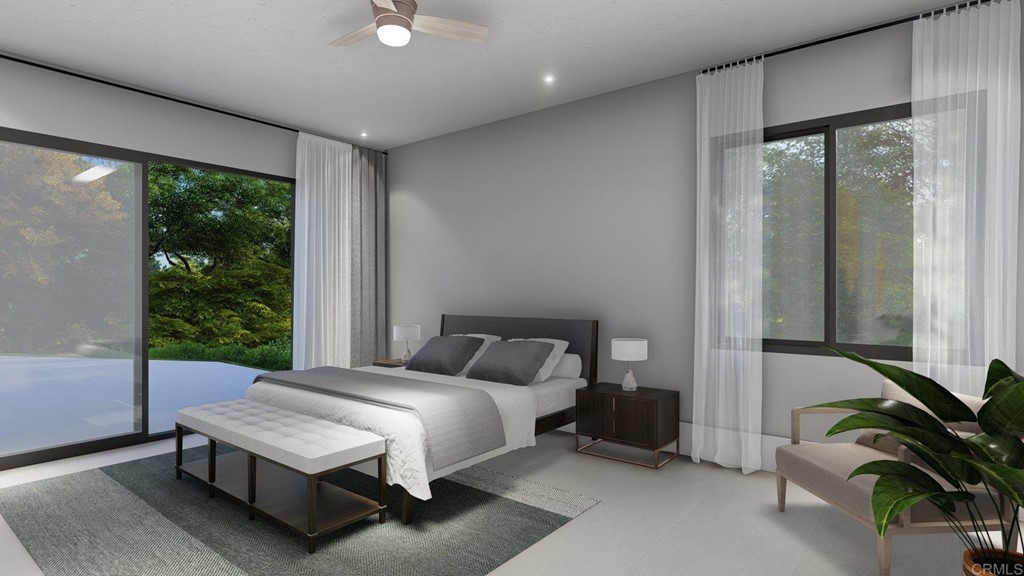 4571 Sun Valley Road Del Mar, CA 92014 - Photo 8 of 11 a bedroom with a bed lamp and a large window