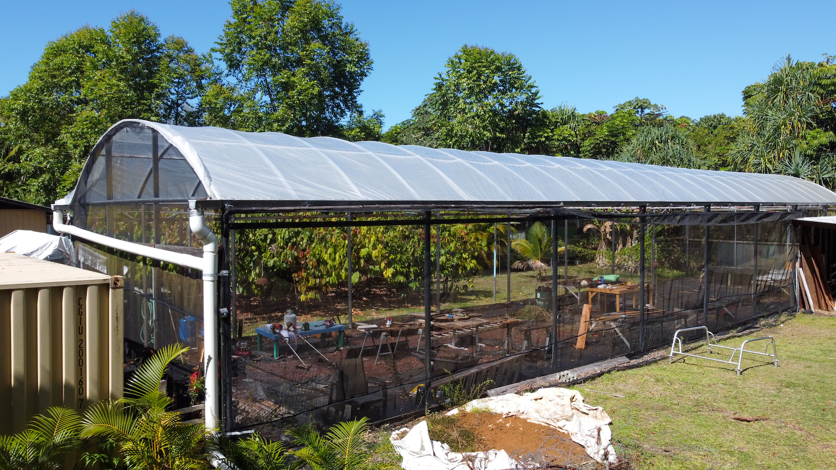 14-249 Pakaka Road Pahoa, HI 96778 - Photo 23 of 29 a view of a patio with table and chairs under an umbrella