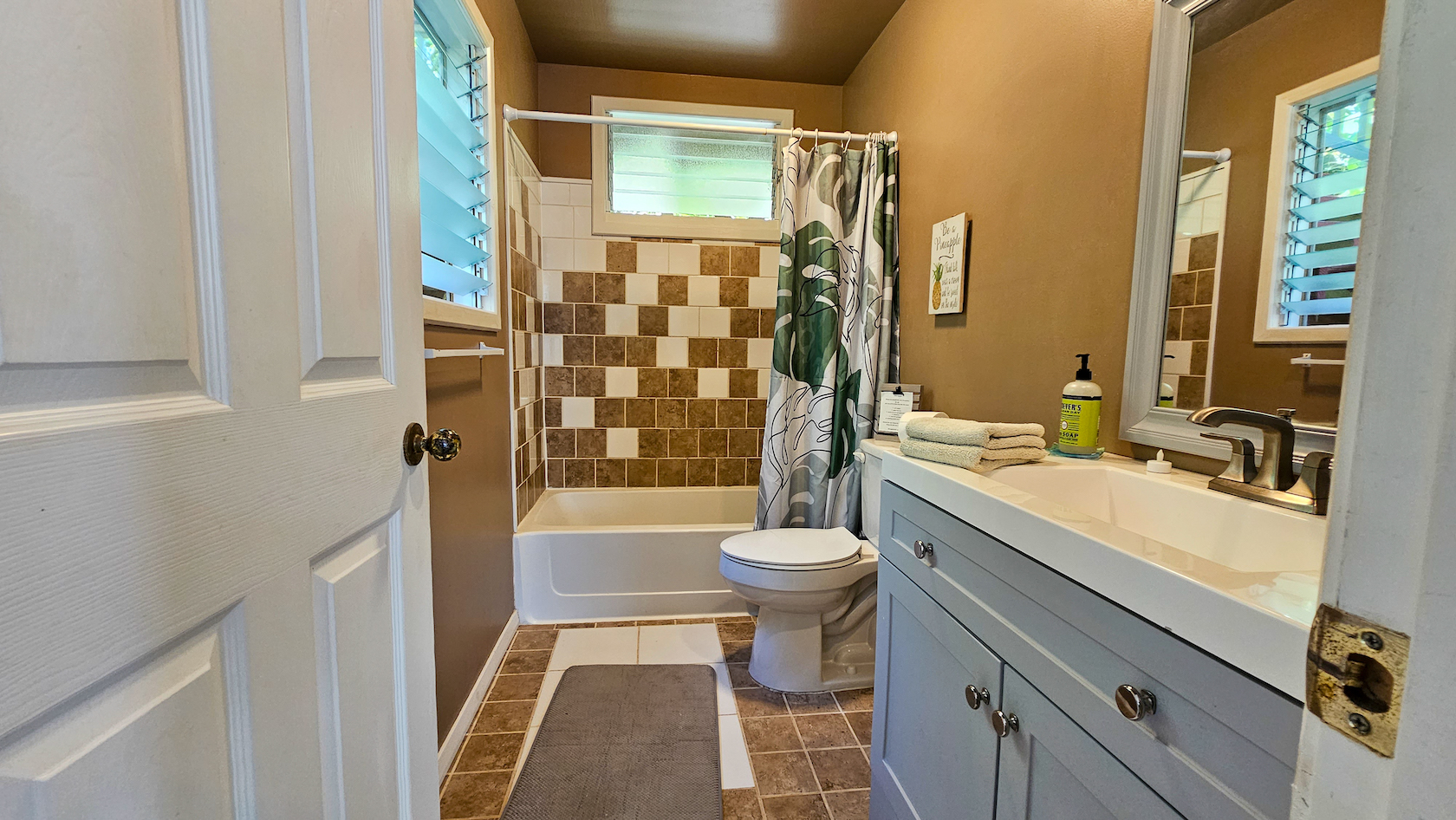 14-249 Pakaka Road Pahoa, HI 96778 - Photo 10 of 29 a bathroom with a sink toilet a shower and a mirror
