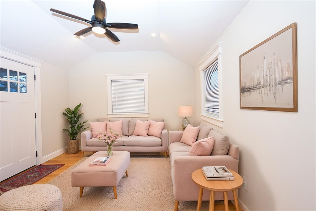 85 Oak Street, Unit 85 Randolph, MA 02368 - Photo 1 of 26 a living room with furniture and a large window