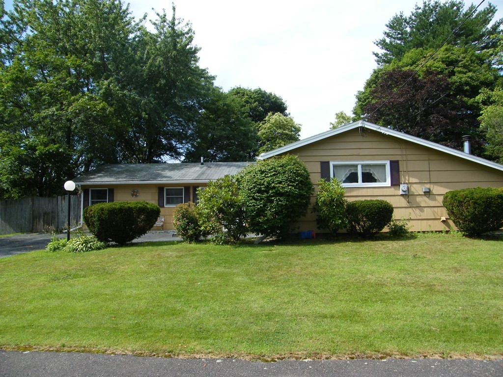 24 Wellesley Road Beverly, MA 01915 - Photo 1 of 9 a view of a house with backyard and sitting area