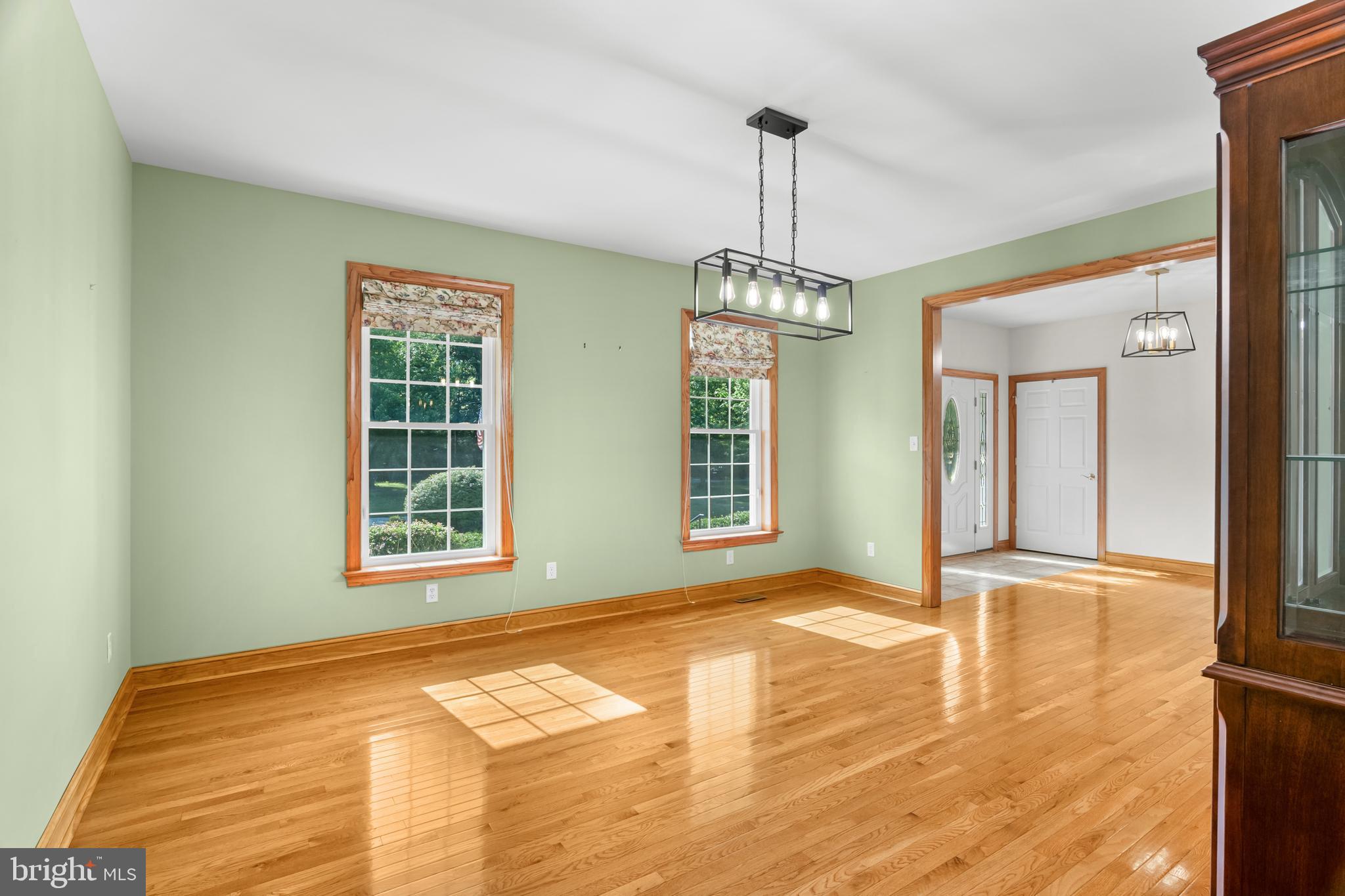 1211 Dexter Corner Road Townsend, DE 19734 - Photo 15 of 66 a view of an empty room with window and chandelier fan