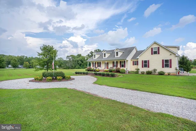 a view of a house with a big yard