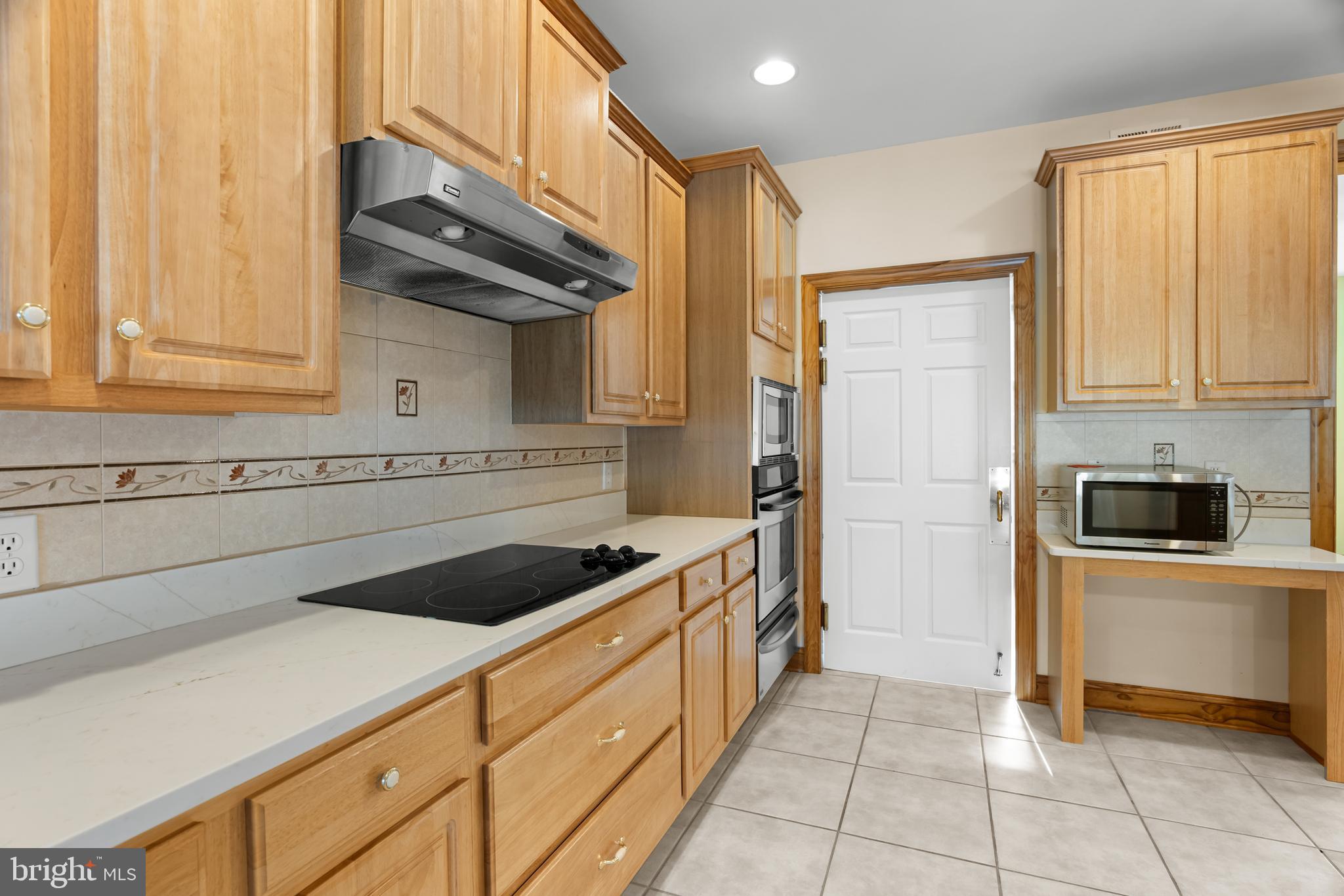 1211 Dexter Corner Road Townsend, DE 19734 - Photo 21 of 66 a kitchen with a sink and cabinets