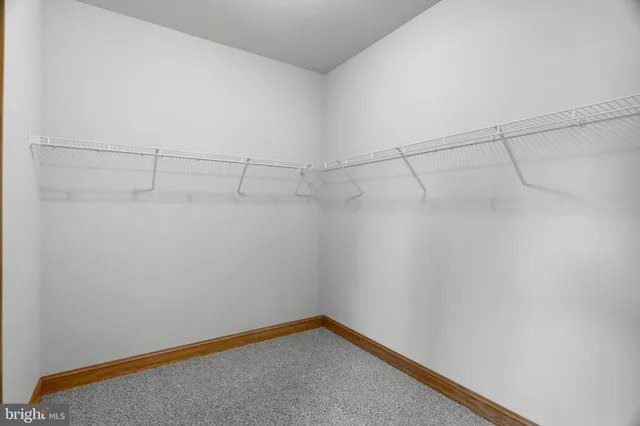 a view of hallway with windows