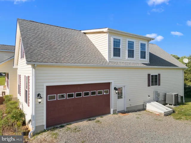 a front view of a house with yard