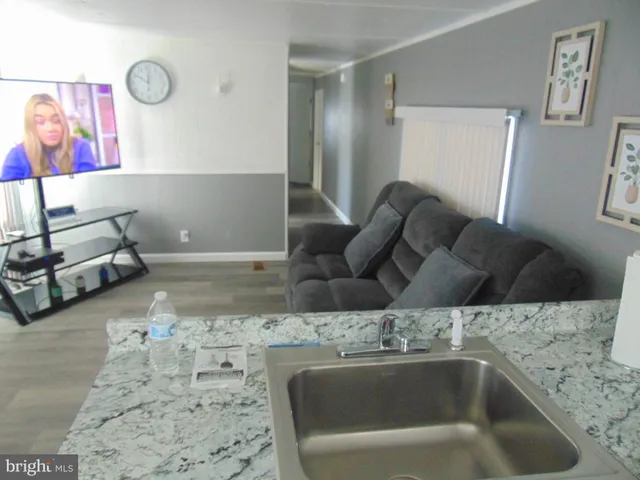 a bathroom with a bathtub and a sink