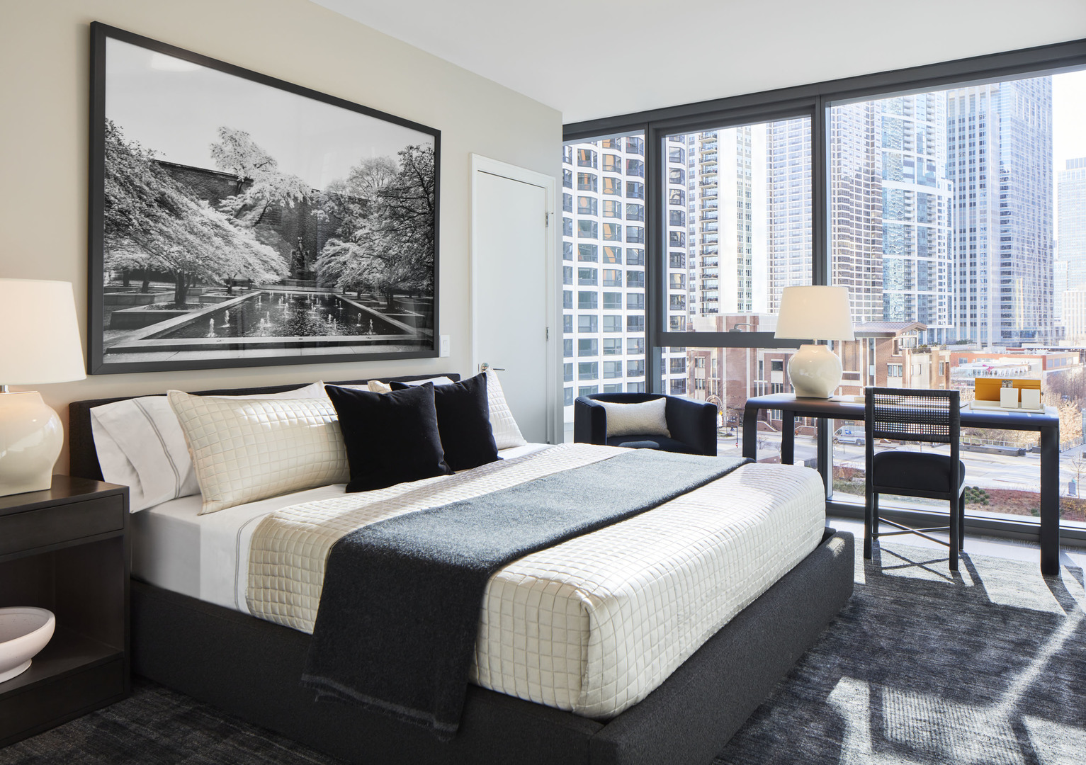 211 North Harbor Drive, Unit 2203 Chicago, IL 60601 - Photo 11 of 18 a bedroom with a bed and a large window