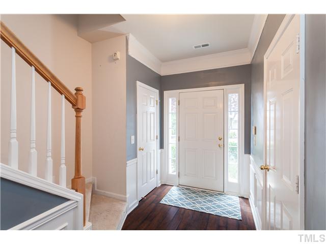 7242 Galon Glen Road Raleigh, NC 27613 - Photo 2 of 17 a view of an entryway with wooden floor