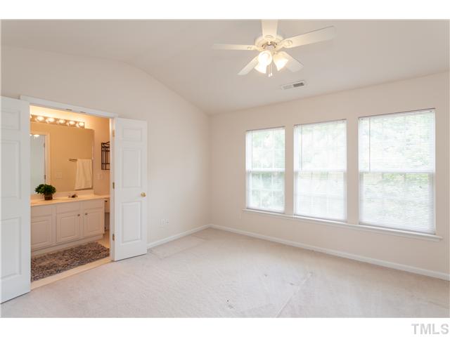 7242 Galon Glen Road Raleigh, NC 27613 - Photo 12 of 17 a view of an empty room with a window