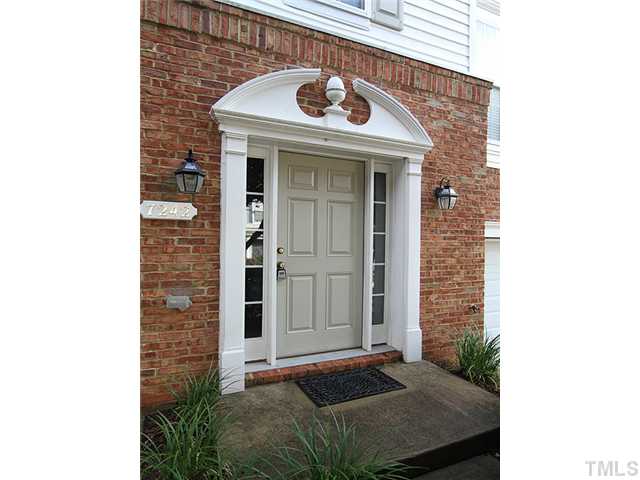 7242 Galon Glen Road Raleigh, NC 27613 - Photo 15 of 17 a front view of a house