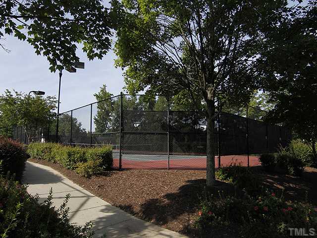 7242 Galon Glen Road Raleigh, NC 27613 - Photo 17 of 17 a backyard of a house with lots of green space
