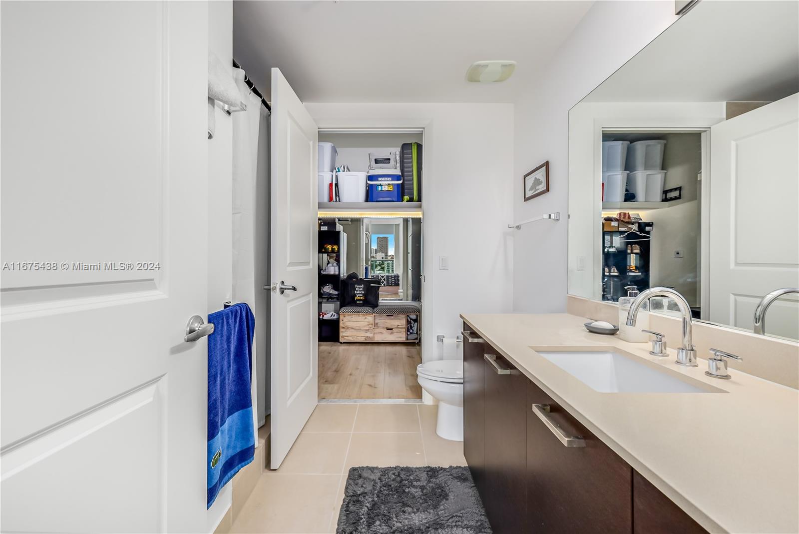 333 Northeast 24th Street, Unit 1206 Miami, FL 33137 - Photo 14 of 26 a en suite bathroom with a double vanity sink