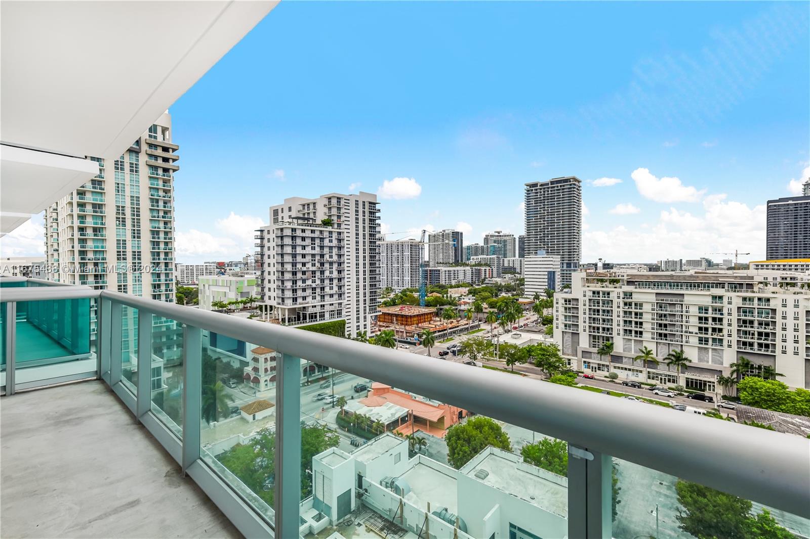 333 Northeast 24th Street, Unit 1206 Miami, FL 33137 - Photo 4 of 26 a city view from a balcony