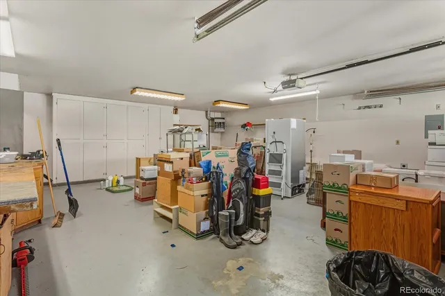 a room with furniture and a chandelier