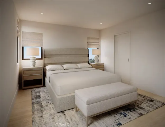 a bedroom with a bed and a couch