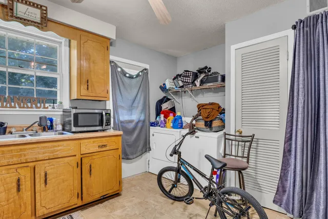 a bedroom with a workspace