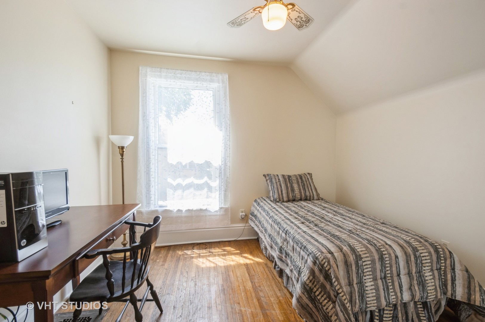128 Forest Avenue Riverside, IL 60546 - Photo 10 of 18 a bedroom with a bed and a window