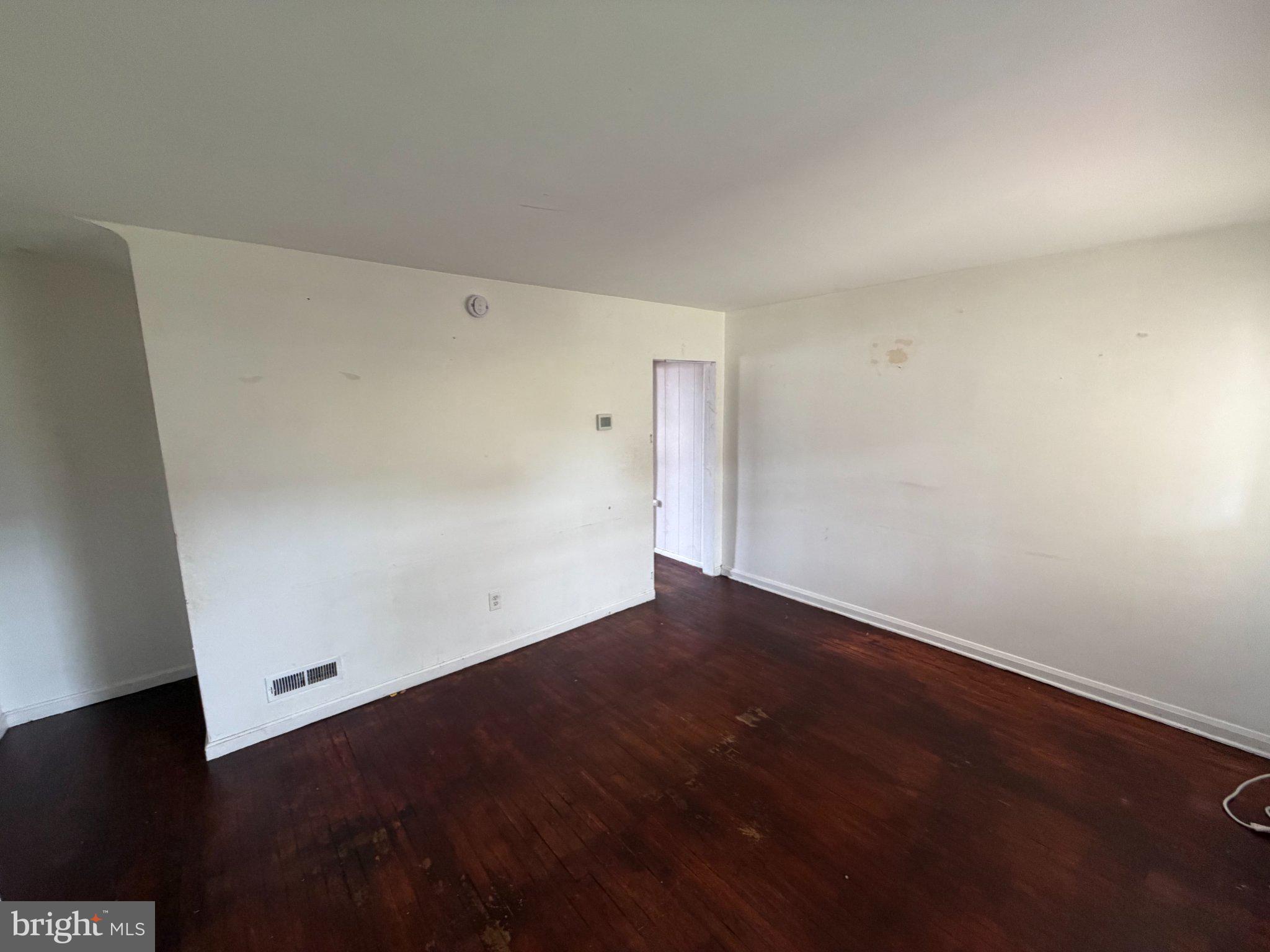 7216 Conley Street Baltimore, MD 21224 - Photo 4 of 14 Spacious room ready for your vision.