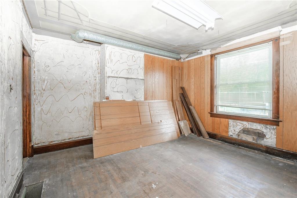 361-383 Collier Road Uniontown, PA 15401 - Photo 20 of 50 a view of an empty room with a window