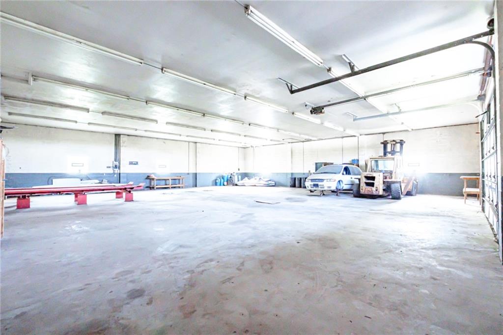 361-383 Collier Road Uniontown, PA 15401 - Photo 42 of 50 a view of parking garage with cars