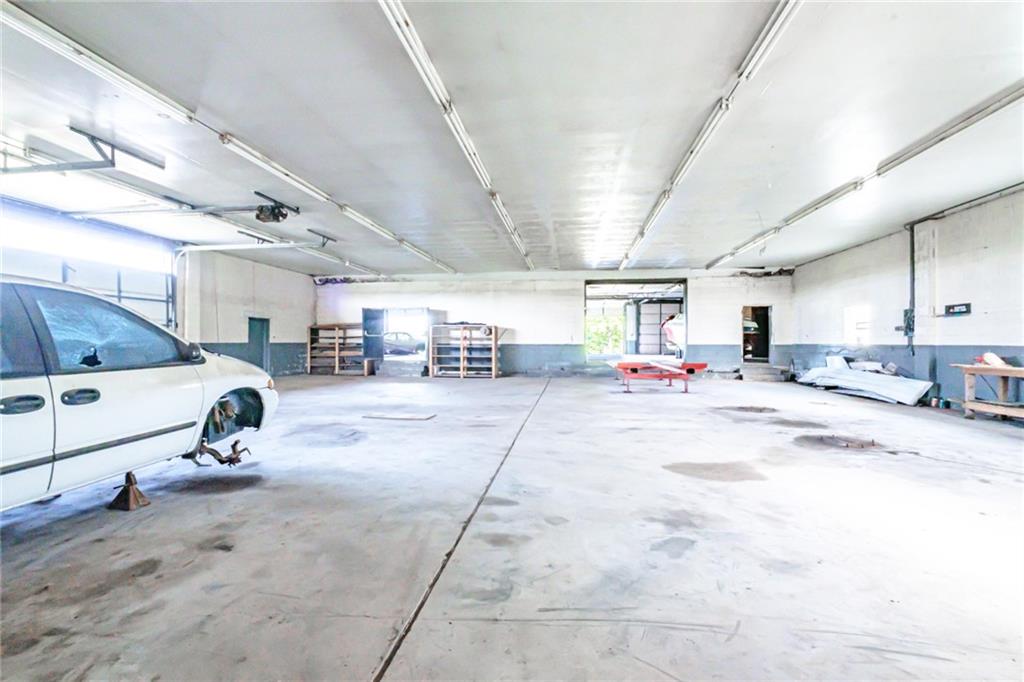 361-383 Collier Road Uniontown, PA 15401 - Photo 43 of 50 a view of parking garage with cars