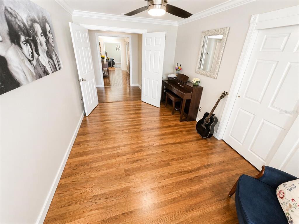 2313 Southeast 7th Street Ocala, FL 34471 - Photo 47 of 54 a view of a living room with furniture and wooden floor
