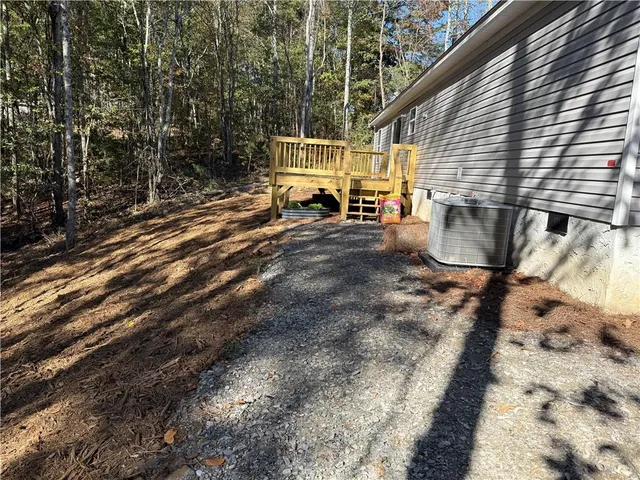 a view of a back yard of the house