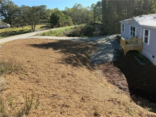 a view of backyard with outdoor space